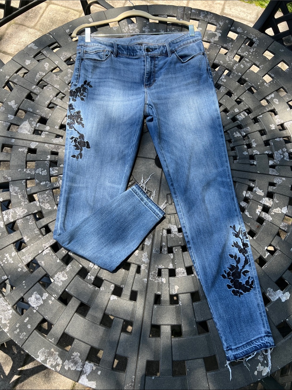 WHBM Jean with black floral embroidery